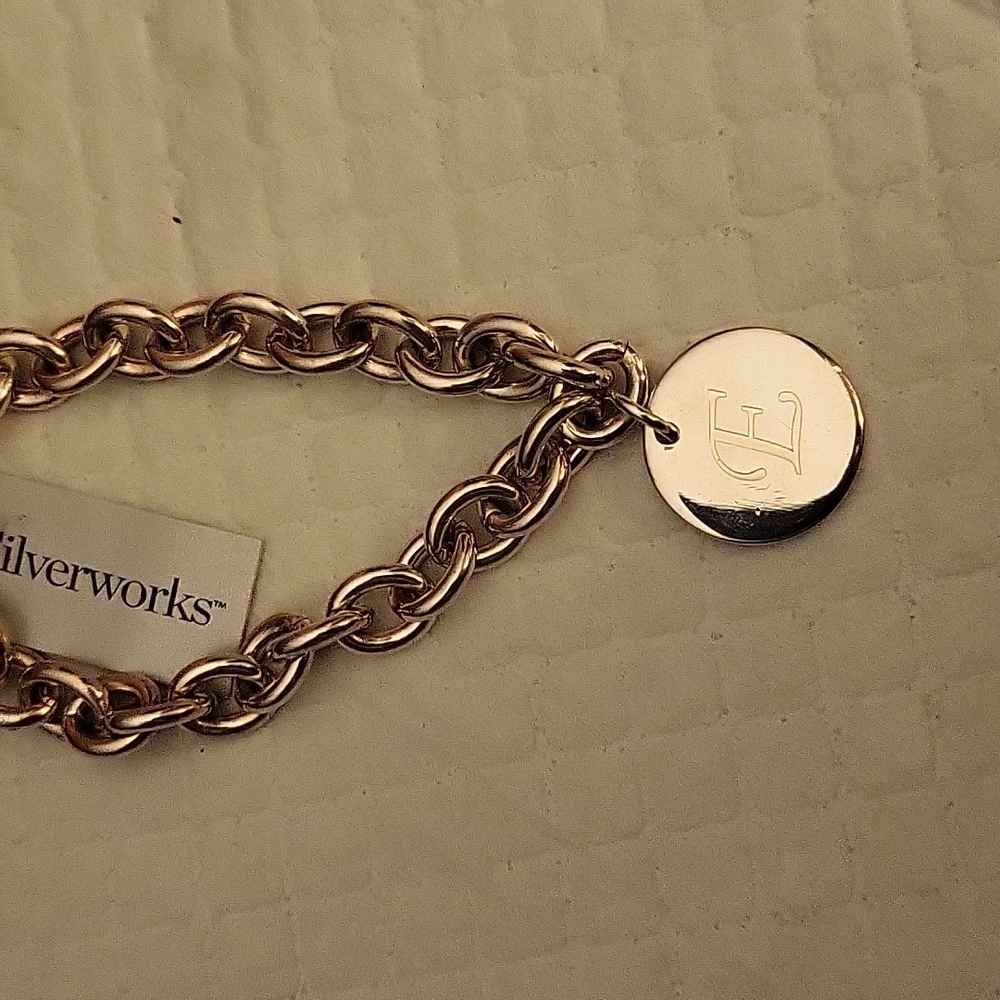 NWT  silver  initial E bracelet  by Silverworks.